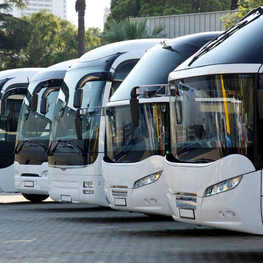 Revel coaches waiting outside airport arrivals