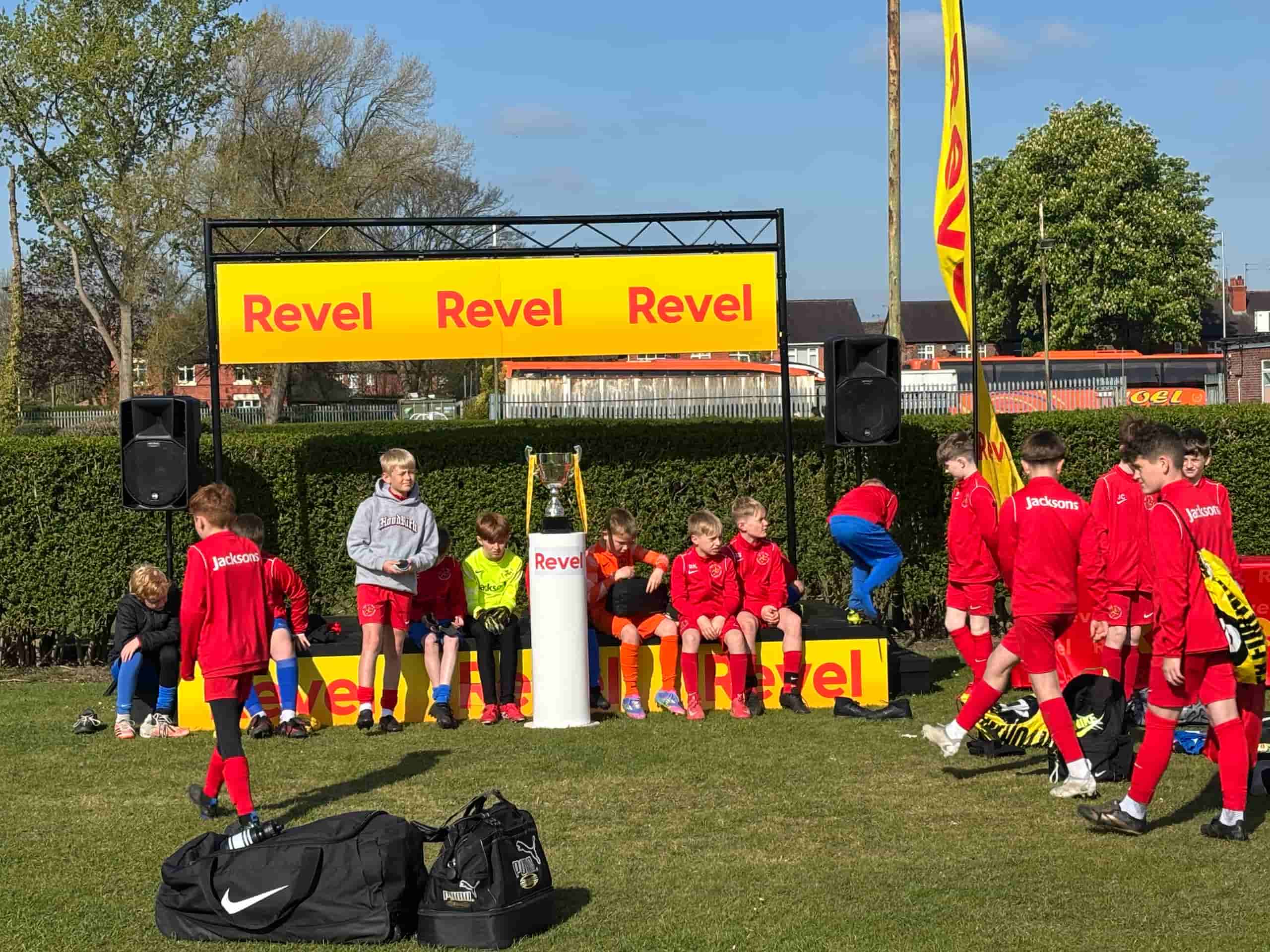 Squads and the cup on the Revel stage between matches